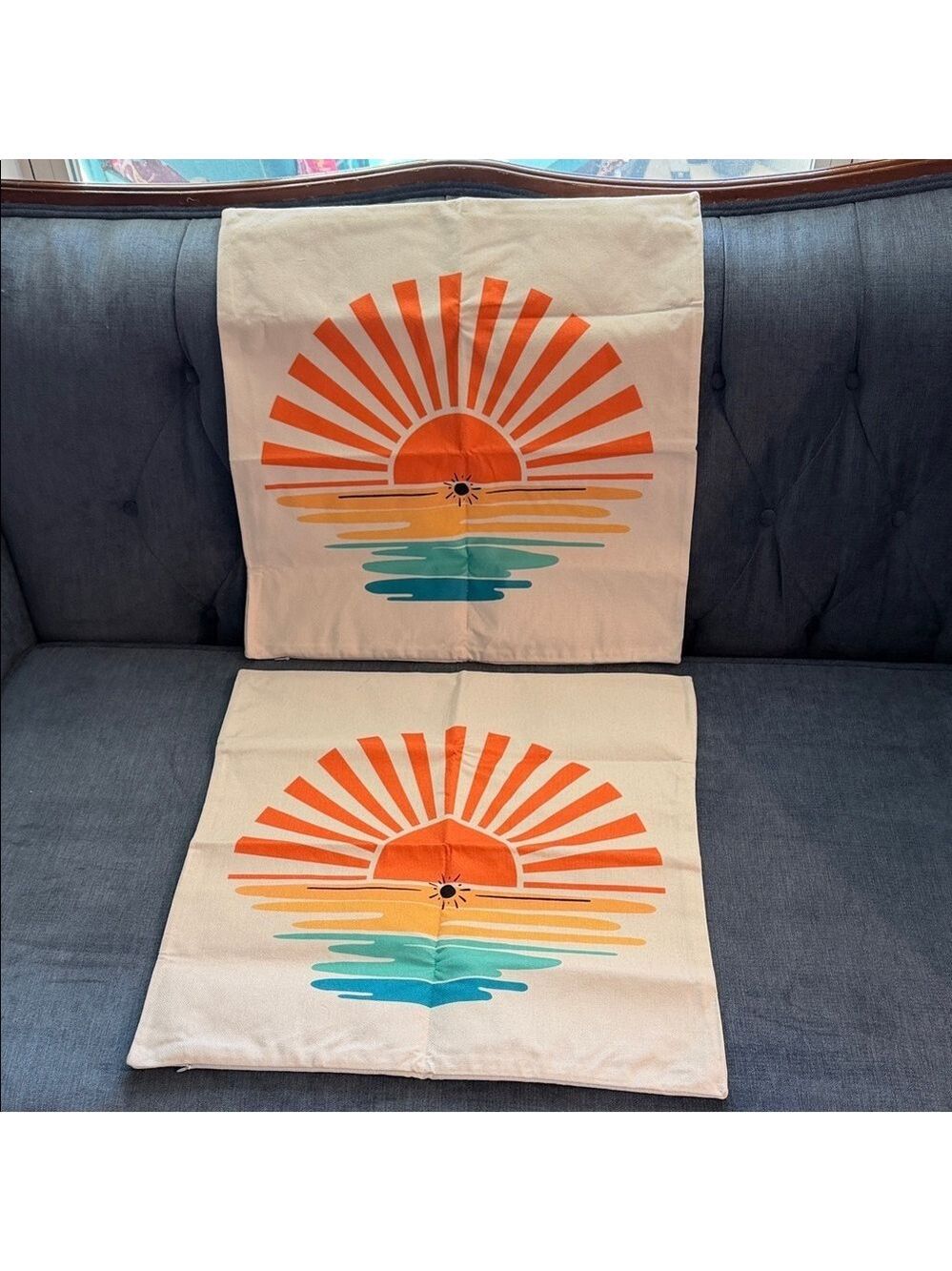 New Pair of Sunset Print Pillow Covers. Featuring the Sun Setting  on the Water.